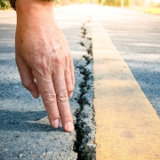 Cracked asphalt road surface